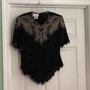 Laurence Kazar size XL silk blouse with various beads. Zippered back.